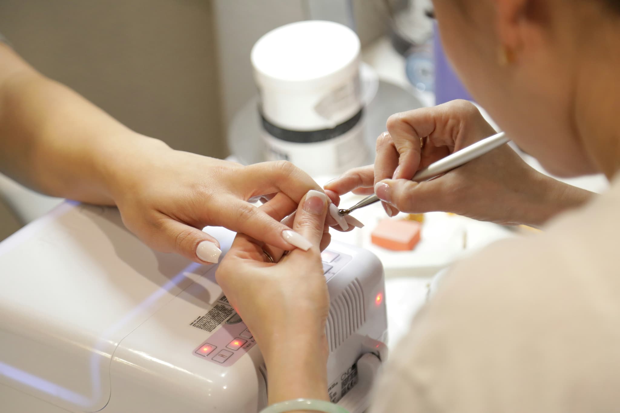 beauty wellness beauty and wellness technician providing manicure service