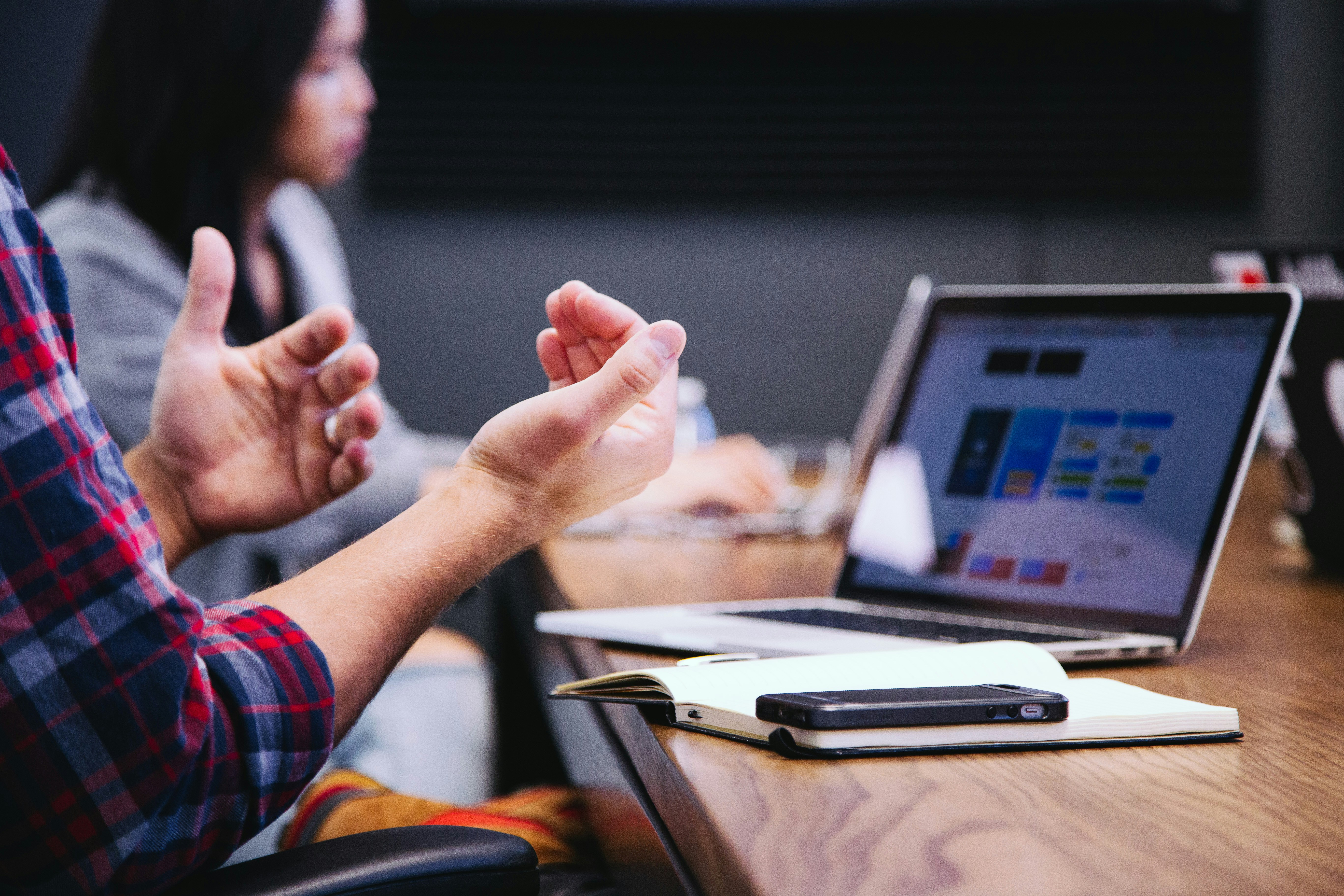 Hands gesturing during a collaborative meeting